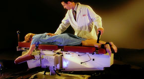 This is a picture of Cox Technic chiropratic spinal manipulation as performed at Lombardy Chiropractic Clinic.